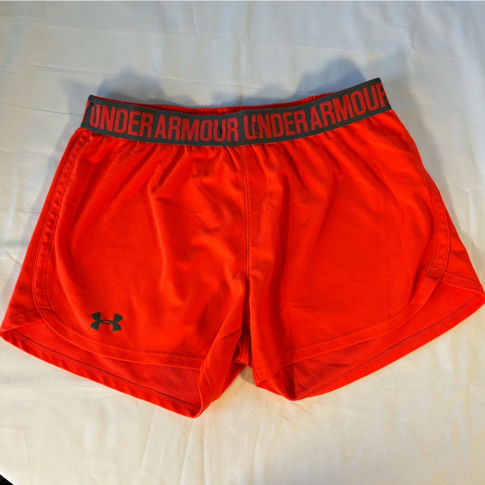 Under Armour Women’s size small heatgear shorts, orangish red, activewear